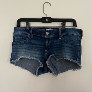 Y2k Hollister low rise short shorts medium wash distressed denim size 9 / 29